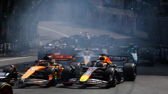 Oscar Piastri (left) held off Max Verstappen on Lap 1. Photo by Mark Thompson/Getty Images.