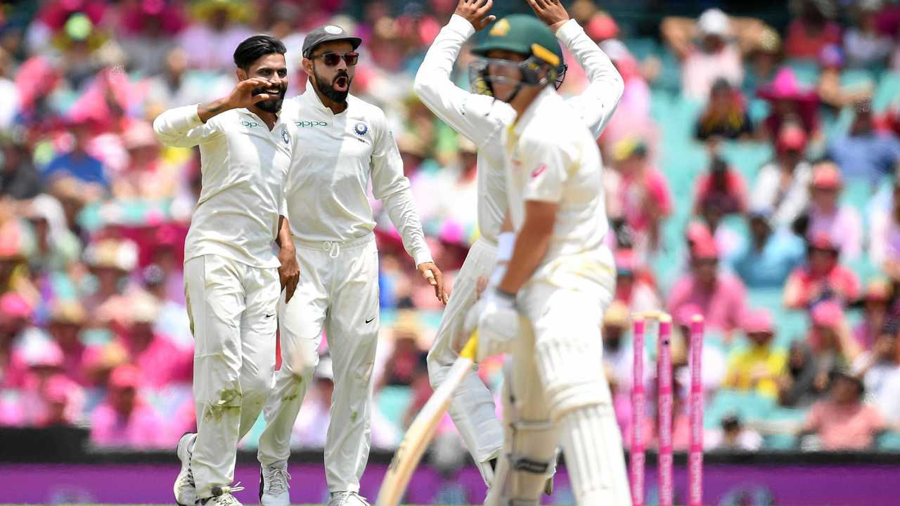 Ravindra Jadeja of India (left) celebrates with Virat Kohli  after taking the wicket of Marcus Harris of Australia on day three of the Fourth Test match between Australia and India at the SCG in Sydney, Saturday, January 5, 2019. (AAP Image/Dan Himbrechts) NO ARCHIVING, EDITORIAL USE ONLY, IMAGES TO BE USED FOR NEWS REPORTING PURPOSES ONLY, NO COMMERCIAL USE WHATSOEVER, NO USE IN BOOKS WITHOUT PRIOR WRITTEN CONSENT FROM AAP. Picture: DAN HIMBRECHTS