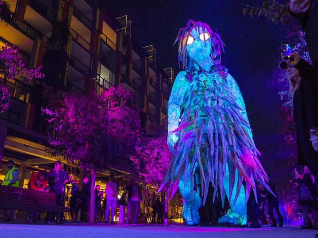 Barangaroo is also home to Wulugul Walk, a giant luminescent creature operated by a team of performers, which ventures along the waterfront. Picture: Steve Christo