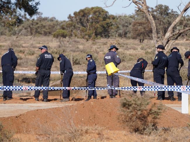 Searching continues along Arumpo Rd at Mourquong on Monday. Picture: Michael DiFabrizio