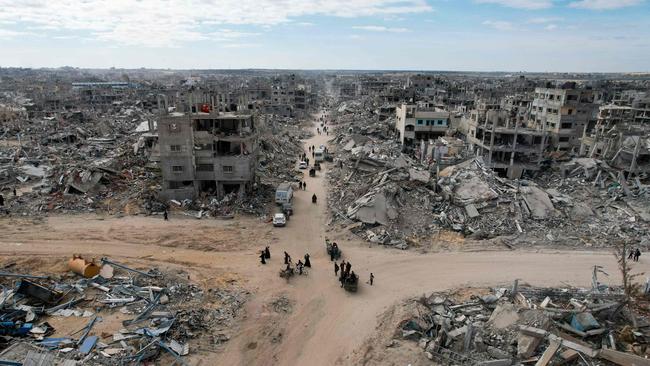 The destruction of Gaza caused by more than 12 months of Israeli airstrikes.