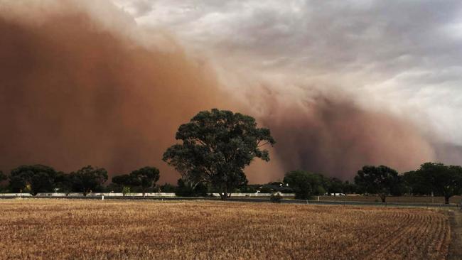 The storm was over as quickly as it started. Farmers braced for the dust in Burley Griffin. Picture: Aaron Burnett