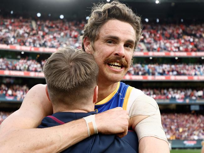 MELBOURNE, AUSTRALIA - SEPTEMBER 28: Lincoln McCarthy (left) and Joe Daniher of the Lions celebrate during the 2024 AFL Grand Final match between the Sydney Swans and the Brisbane Lions at The Melbourne Cricket Ground on September 28, 2024 in Melbourne, Australia. (Photo by Michael Willson/AFL Photos via Getty Images)