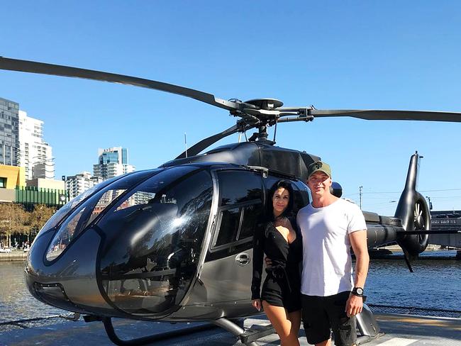 Sea World Helicopters pilot Ash Jenkinson, with partner Kosha Richardson-Johnson, who was shocked to have received the infringement notice in the mail.