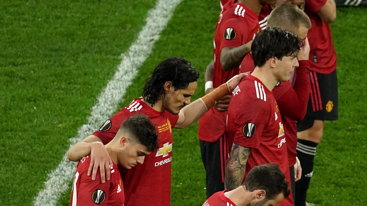 Manchester United stars cut a dejected team.