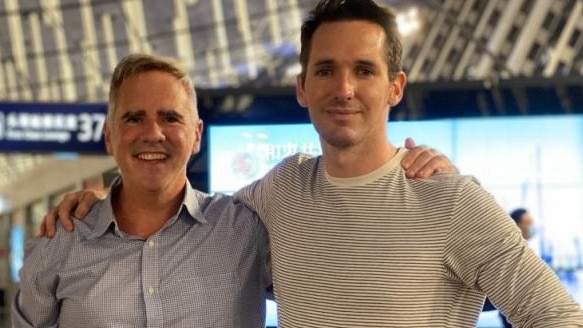 The Australian Financial Review's Michael Smith (left) and the ABC's Bill Birtles flew out of Shanghai on Monday night.