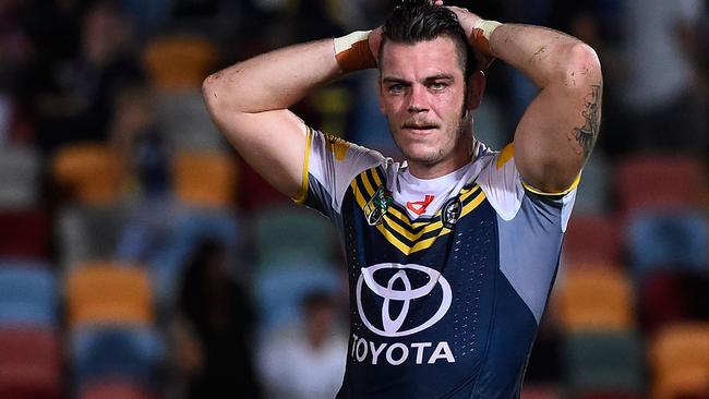 TOWNSVILLE, AUSTRALIA - MARCH 14: Ethan Lowe of the Cowboys looks dejected after losing the round two NRL match between the North Queensland Cowboys and the Newcastle Knights at 1300SMILES Stadium on March 14, 2015 in Townsville, Australia. (Photo by Ian Hitchcock/Getty Images)