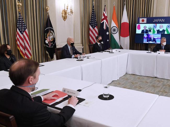 US President Joe Biden (C), with Secretary of State Antony Blinken (C R), Vice President Kamala Harris (L) and National Security Adviser Jake Sullivan, meet virtually with members of the Quad alliance of Australia, India, Japan and the US. Picture: AFP