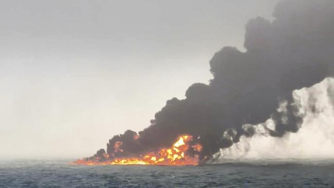 Smoke billows after a cargo ship hit a tanker carrying jet fuel off eastern England, sending fuel pouring into the North Sea. Picture: Bartek Śmiałek via AP