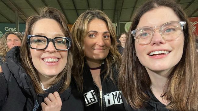 ABC RN Breakfast host Patricia Karvelas, centre, at a Collingwood match. Source: Instagram.