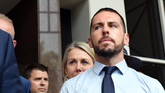 Zachary Rolfe looks to Police Union boss Paul McCue as he addresses media after the verdict. Picture: (A)manda Parkinson