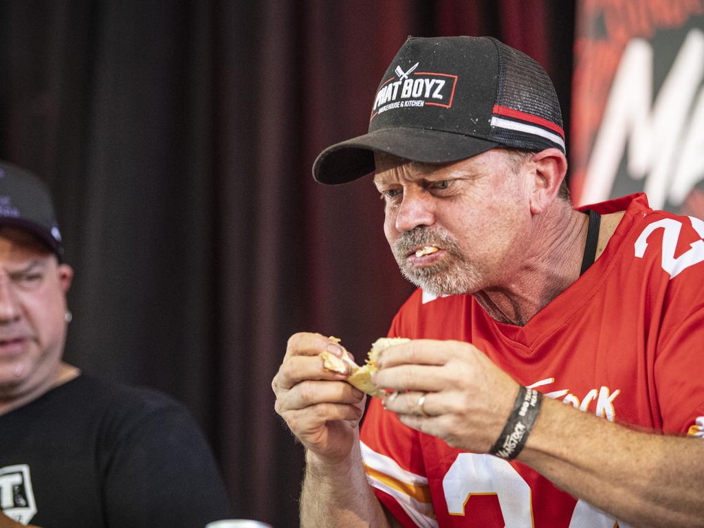 Shannon Walker in the Phat Boyz Slider Throwdown eating competition at Meatstock at Toowoomba Showgrounds, Sunday, March 10, 2024. Picture: Kevin Farmer