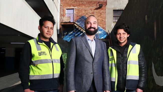 Moe Sultan with brothers Reza Rezaie and Ali Rezaie members of the local Hazara community who came from Kabul Afghanistan five years ago and have employment with Sultan Holdings. Moe Sultan has launched a foundation in honour of this late father Ali Sultan with the aim to help refugees find their way in Tasmania. Picture: Nikki Davis-Jones