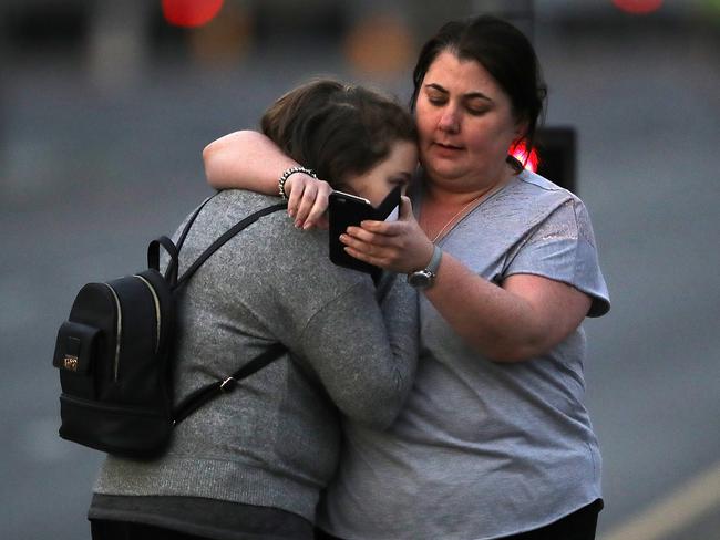 Ariana Grande concert attendees Vikki Baker and her daughter Charlotte, aged 13, leave the Park Inn after the explosion. Picture: Getty