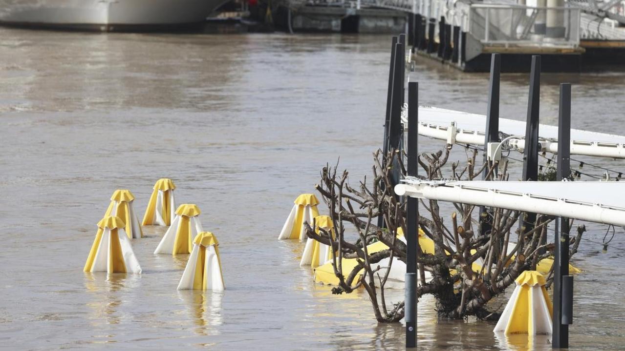 Only the tops of umbrellas were visible during the floods.