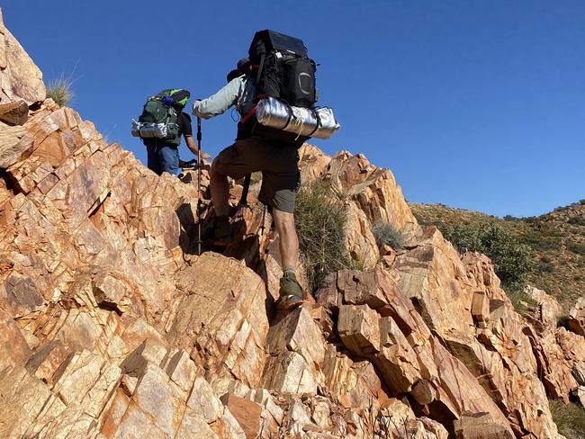 Larapinta Trail: Trekkers on ridgetop near Brinkley Bluff in the Northern Territory. Picture: Ryan Cox