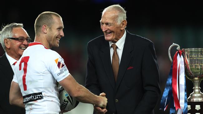 NRL ANZAC Day match - Sydney Roosters v St. George-Illawarra Dragons at Allianz Stadium. Ben Hornby with Norm Provan.