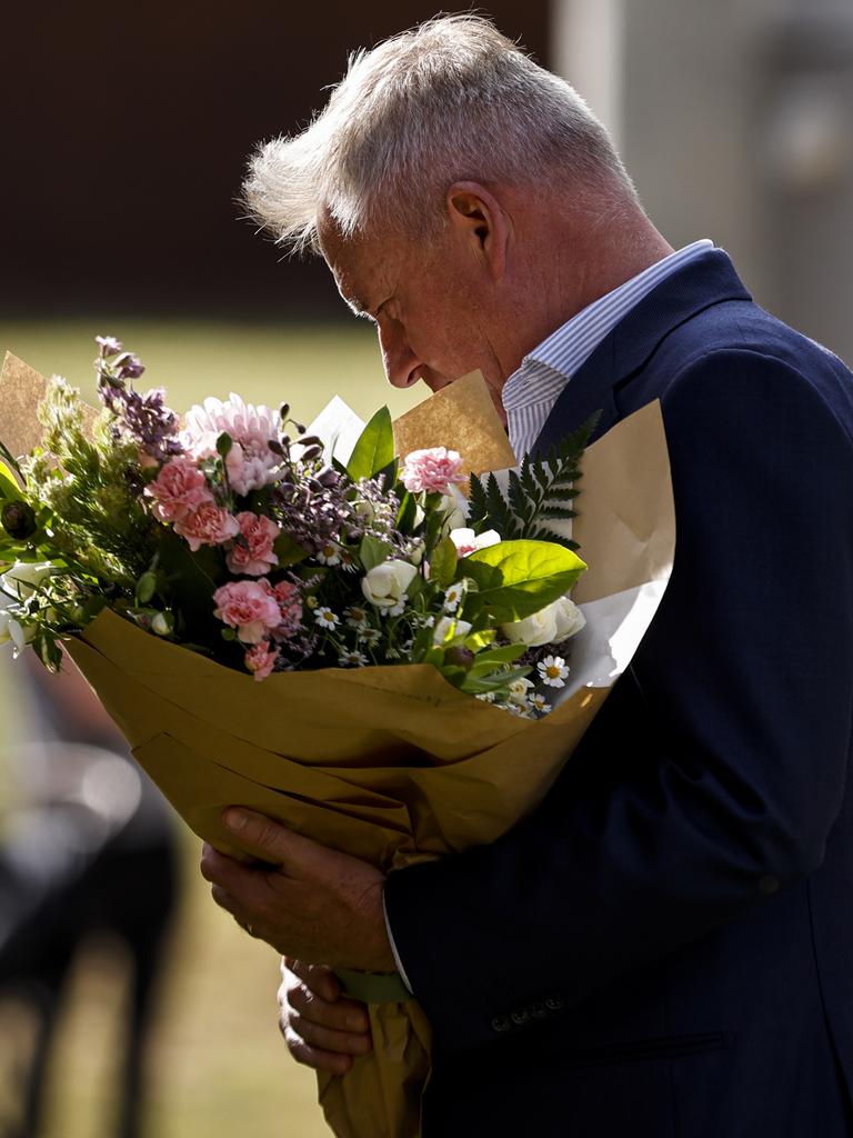 Premier Jeremy Rockliff lays flowers in memory of the children lost in the Hillcrest tragedy. Picture: Grant Viney