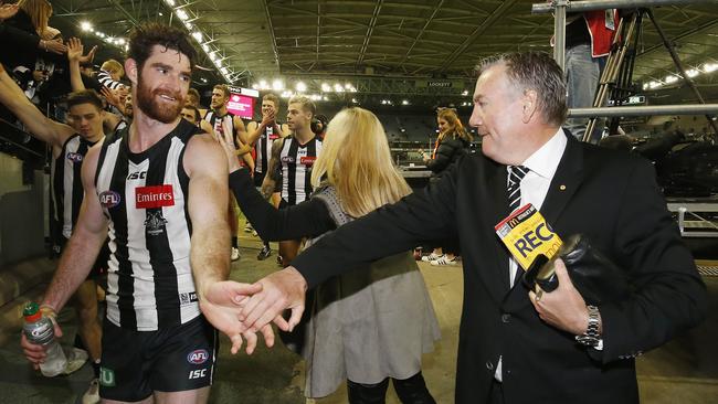 Tyson Goldsack and Eddie McGuire enjoy a Collingwood win.