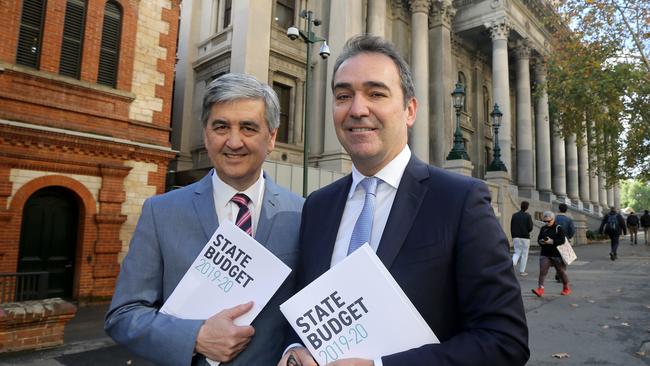 Treasurer Rob Lucas and Premier Steven Marshall with the 2019 State Budget papers. Picture: Kelly Barnes/AAP