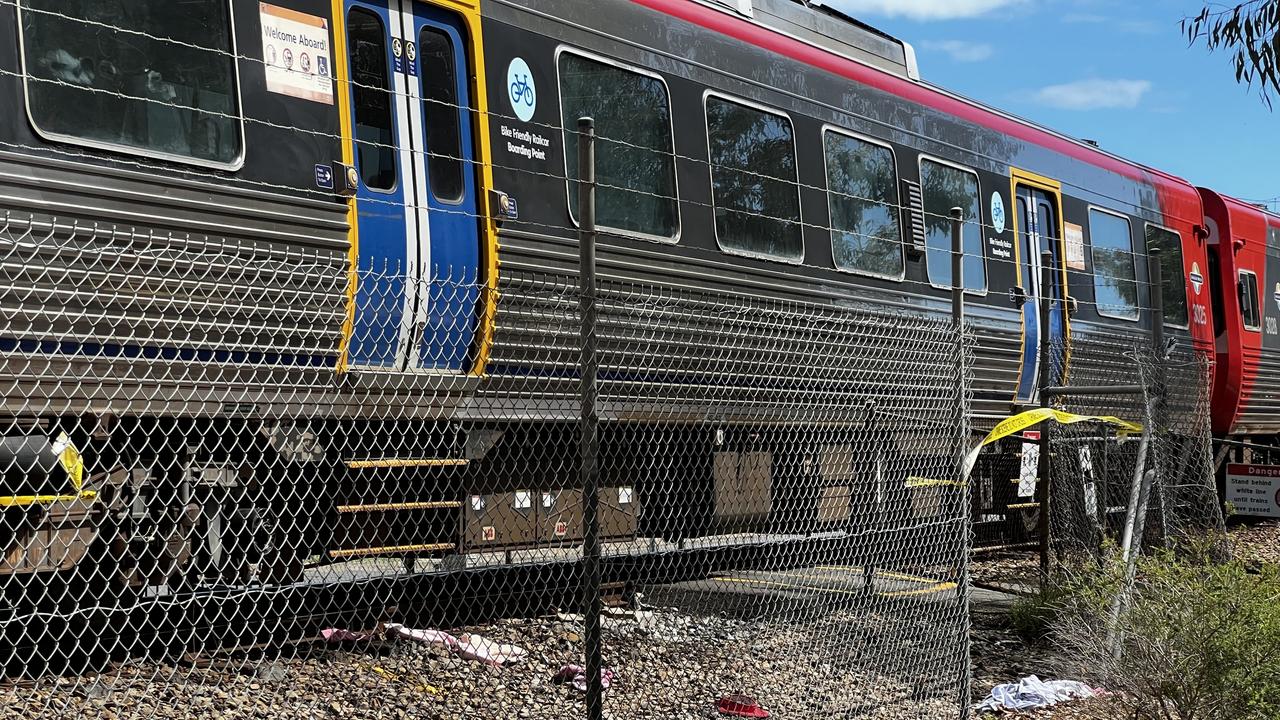 Emergency services are at the scene of a serious rail crash at Grange after a pedestrian was struck by a train, suffering life-threatening injuries. Picture: NCA NewsWire / Emma Brasier