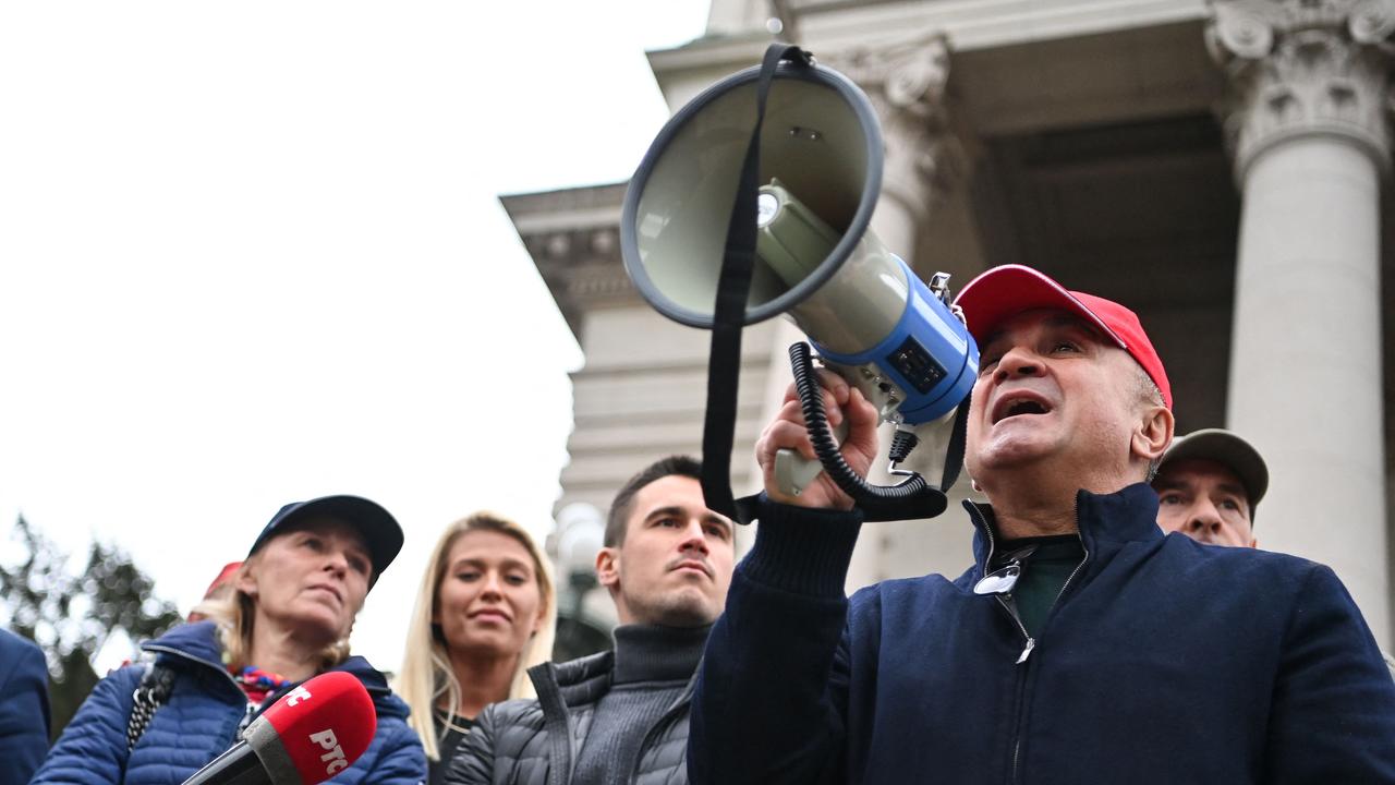 Srdan Djokovic addresses a rally in front of Serbia's National Assembly in Belgrade. Picture: Andrej Isakovic/AFP