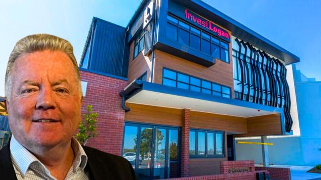 Chair of investLogan Steve Greenwood with the three-storey investLogan building at Springwood which cost ratepayers more than $4 million.