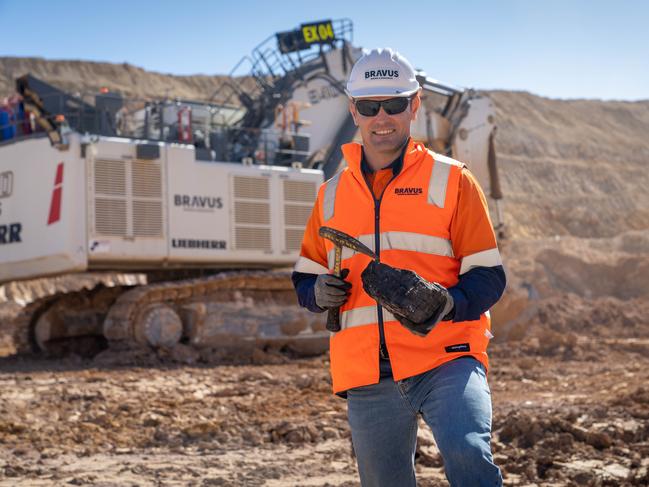 Bravus Mining and Resources CEO David Boshoff with the first chunk of coal mined at the Carmichael mine. Picture: Cameron Laird