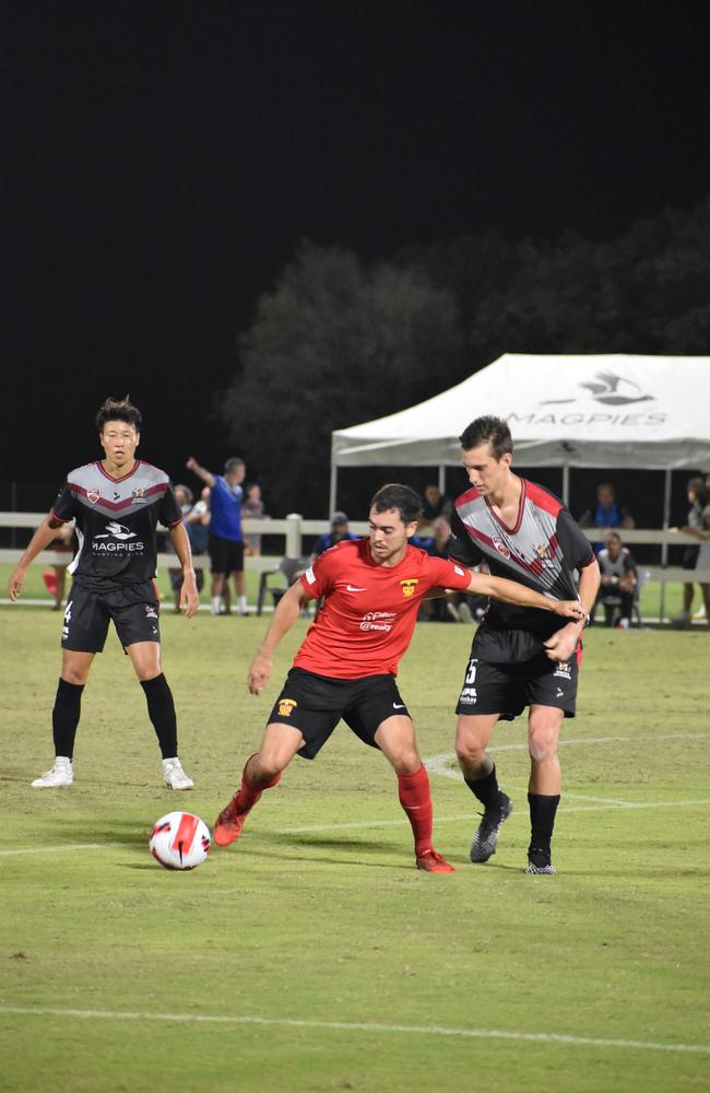 Crusaders Junya Yabe and Daniel Simic in a tackle in Magpies Crusaders v Sunshine Coast Fire in the FQPL1 at Sologinkin Oval. Saturday, March 19, 2022. Picture: Tara Miko