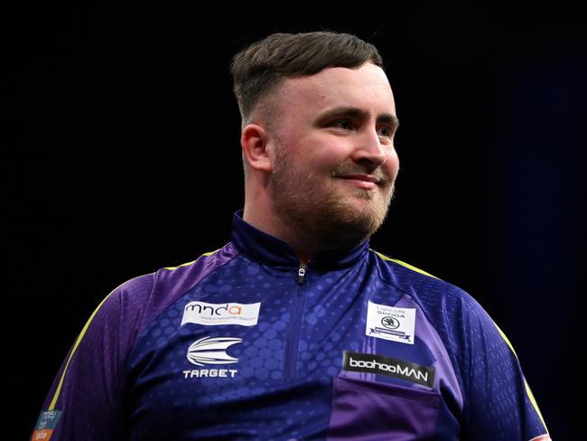 LONDON, ENGLAND - MAY 23: Luke Littler of England reacts after getting a 9 dart finish in the Final against Luke Humphries of England at the 2024 BetMGM Premier League Darts Play-Offs at The O2 Arena on May 23, 2024 in London, England. (Photo by Justin Setterfield/Getty Images)