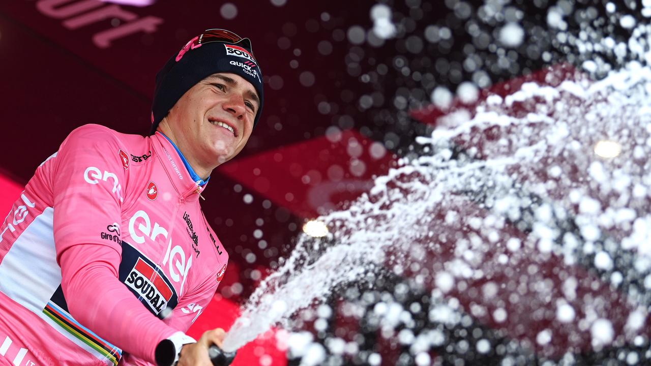 CESENA, ITALY – MAY 14: Remco Evenepoel of Belgium and Team Soudal – Quick Step celebrates at podium as Pink Leader Jersey winner during the 106th Giro d'Italia 2023, Stage 9 a 35km individual time trial stage from Savignano sul Rubicone to Cesena / #UCIWT / on May 14, 2023 in Cesena, Italy. (Photo by Tim de Waele/Getty Images)