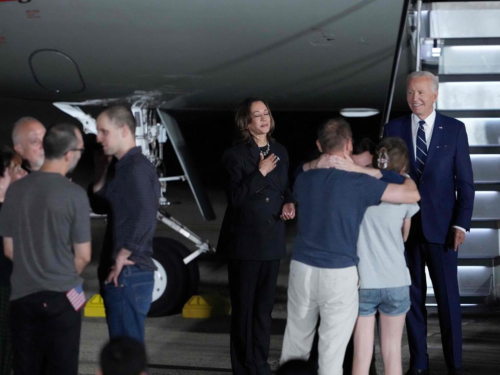 US President Joe Biden and US Vice President Kamala Harris welcome Paul Whelan, Evan Gershkovich and Alsu Kurmasheva, all prisoners freed by Russia, as they arrive at Joint Base Andrews, Maryland. Picture: AFP