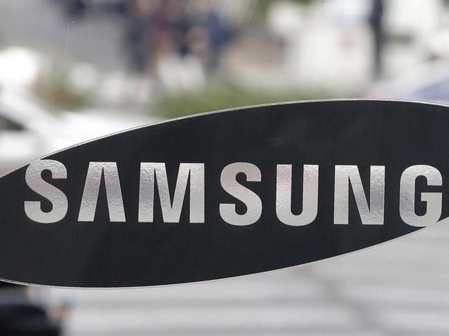 The logo of Samsung Electronics Co. is seen at a Samsung Electronics shop in Seoul, South Korea, Thursday, Oct. 30, 2014. Samsung Electronics Co. admitted erring in its smartphone strategy and vowed to overhaul its handset lineup after profit from those devices tumbled last quarter to the lowest in more than three years. The South Korean company, which climbed from smartphone laggard to top seller in the past three years, had prided itself on responding quickly to market demand and ability to tailor handsets to the needs of users and mobile carriers around the world. (AP Photo/Lee Jin-man)