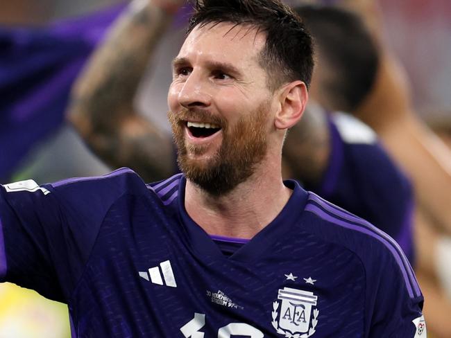 DOHA, QATAR - NOVEMBER 30: Lionel Messi of Argentina celebrates victory following the FIFA World Cup Qatar 2022 Group C match between Poland and Argentina at Stadium 974 on November 30, 2022 in Doha, Qatar. (Photo by Catherine Ivill/Getty Images)