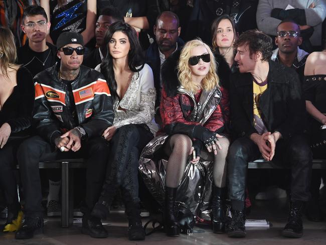 Tyga, Kylie Jenner, Madonna and Steven Klein attend the Front Row for the Philipp Plein Fall/Winter 2017/2018 Women’s And Men’s Fashion Show at The New York Public Library on February 13, 2017 in New York City. Picture: Getty