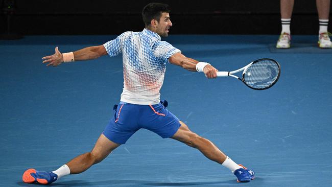 Djokovic at full stretch in Sunday night’s final despite complaints of a significant hamstring injury that hampered him throughout the Open. Picture: AFP