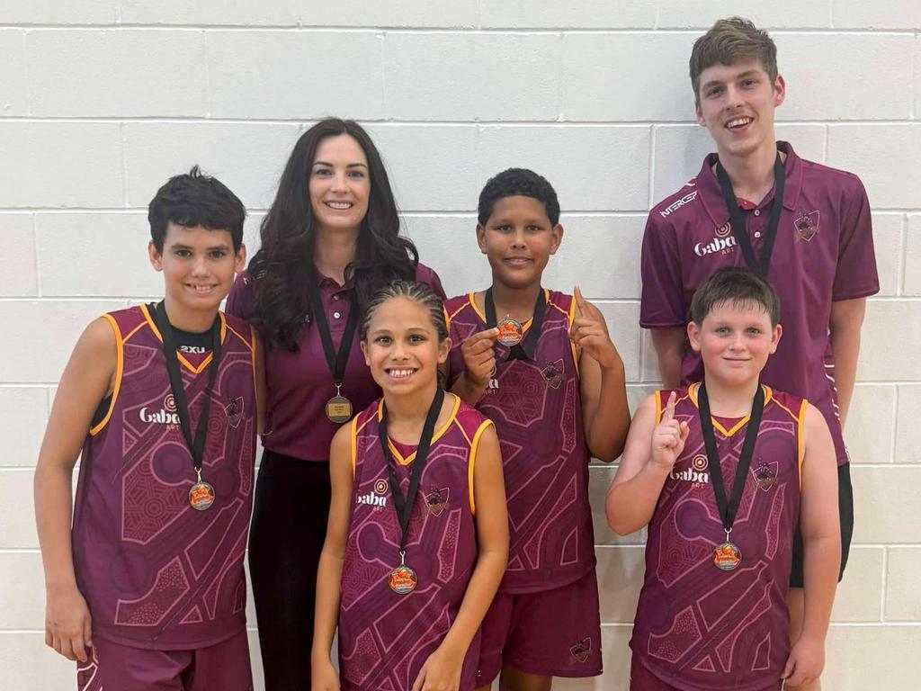 The Rockhampton contingent of the winning Warriors - manager Kassie Hooper, coach Luke Greany, captain Chace Webber, Boston Butler, Anyieth Ayuen and Charlie McGilvary.