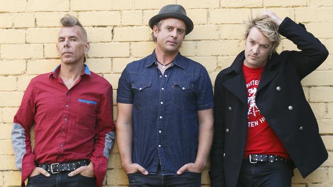 The Living End in Melbourne, 2018, ahead of the release of eighth album ‘Wunderbar’. L-R: Scott Owen (double bass), Andy Strachan (drums) and Chris Cheney (guitar/vocals). Picture: Tim Pascoe