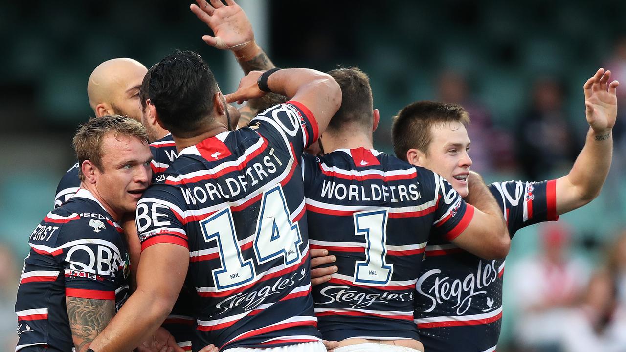 Roosters Cooper Cronk celebrates after scoring a try during the Sydney Roosters v St George NRL match at Allianz Stadium, Sydney. Picture: Brett Costello