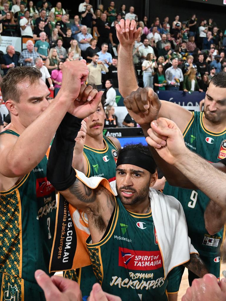 Jordon Crawford of the Jackjumpers celebrates his side’s win over Adelaide with teammates. Picture: Steve Bell/Getty Images.