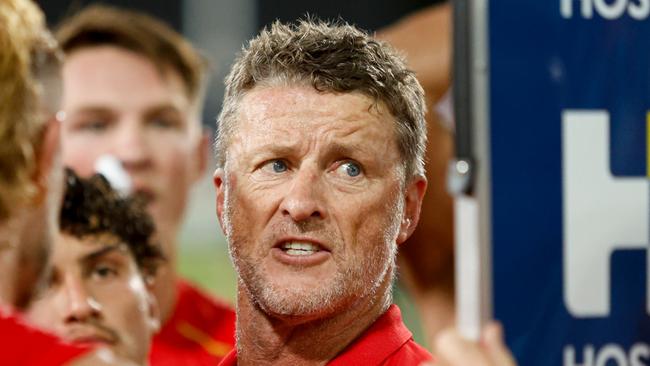 DARWIN, AUSTRALIA - MAY 11: Damien Hardwick, Senior Coach of the Suns addresses his players at three quarter time during the 2024 AFL Round 09 match between the Gold Coast SUNS and North Melbourne Kangaroos at TIO Stadium on May 11, 2024 in Darwin, Australia. (Photo by Dylan Burns/AFL Photos via Getty Images)