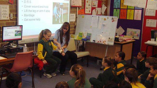 Youngsters learn first aid training at their primary school.