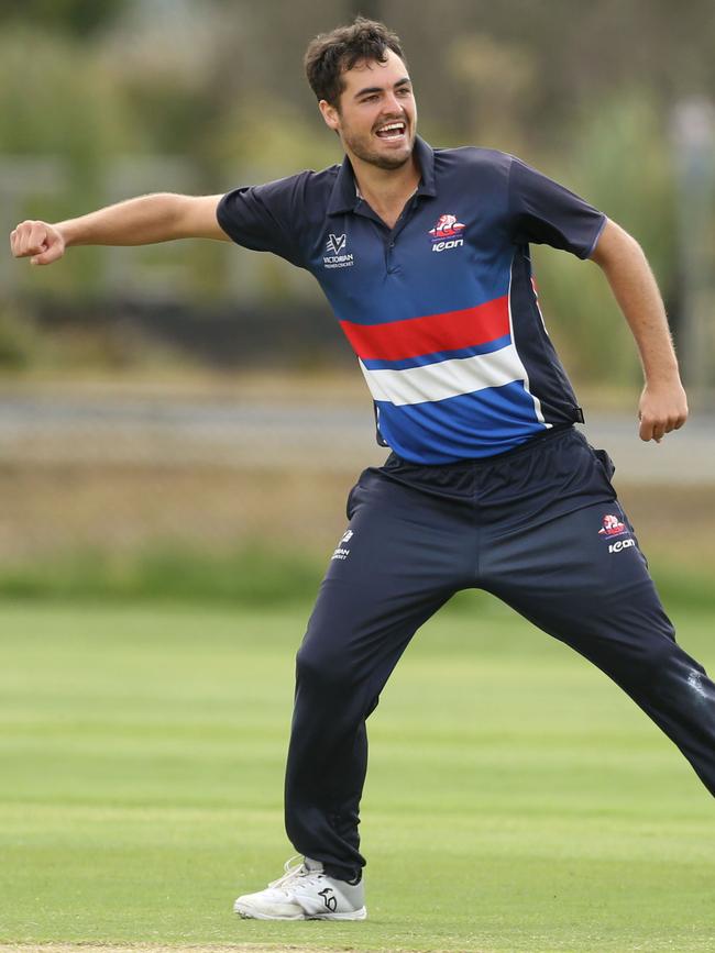 Premier: Footscray bowler Tim Hughes celebrates a wicket. Picture: Stuart Milligan