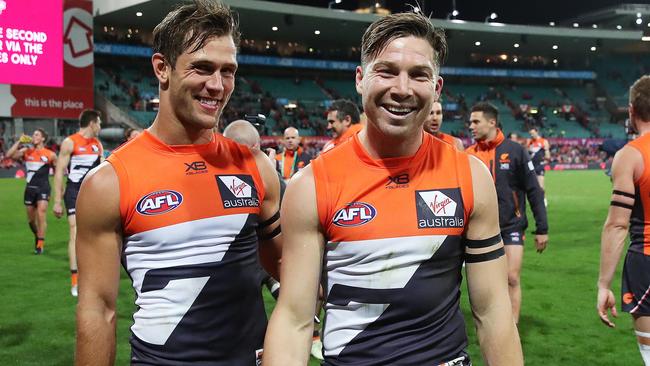 Matt de Boer and Toby Greene celebrate a GWS win. Picture: Phil Hillyard