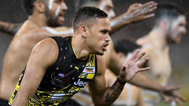 Sydney Stack performs a tribal dance before the Dreamtime game. Picture: Getty Images