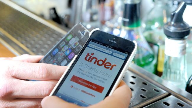 Online Valentines ... A Pureprofile survey found potential Tinder matches should discuss the dogs versus cats debate. Pic Keryn Stevens