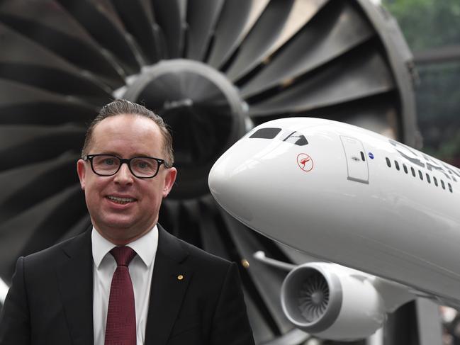 Qantas Group Chief Executive Officer Alan Joyce poses for photographers after announcing the company's half-year financial results in Sydney, Thursday, February 22, 2018. Qantas has announced an 18 percent profit increase. (AAP Image/Dean Lewins) NO ARCHIVING