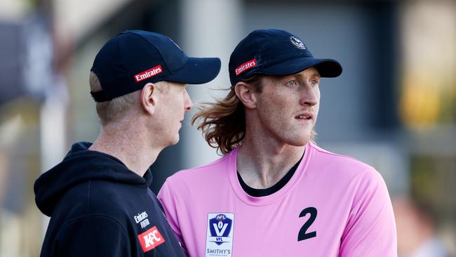 Nathan Murphy acted as a runner in Collingwood’s intraclub game and will miss both practice matches with no timeline on his return to play. Picture: Dylan Burns / Getty Images