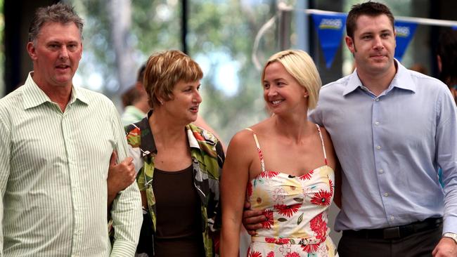 Brooke Hanson with husband Jared Clarke (R) and parents Ian and Sue after she announced her retirement from competition at the Warringah Aquatic Centre in Sydney. Picture: Gregg Porteous