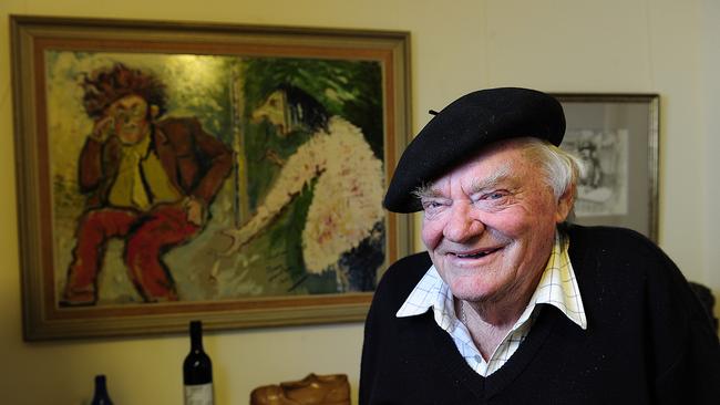 David Dridan in his studio at Stathalbyn with a painting of David and Barry painted by Barry Humphries. Picture: Mark Brake